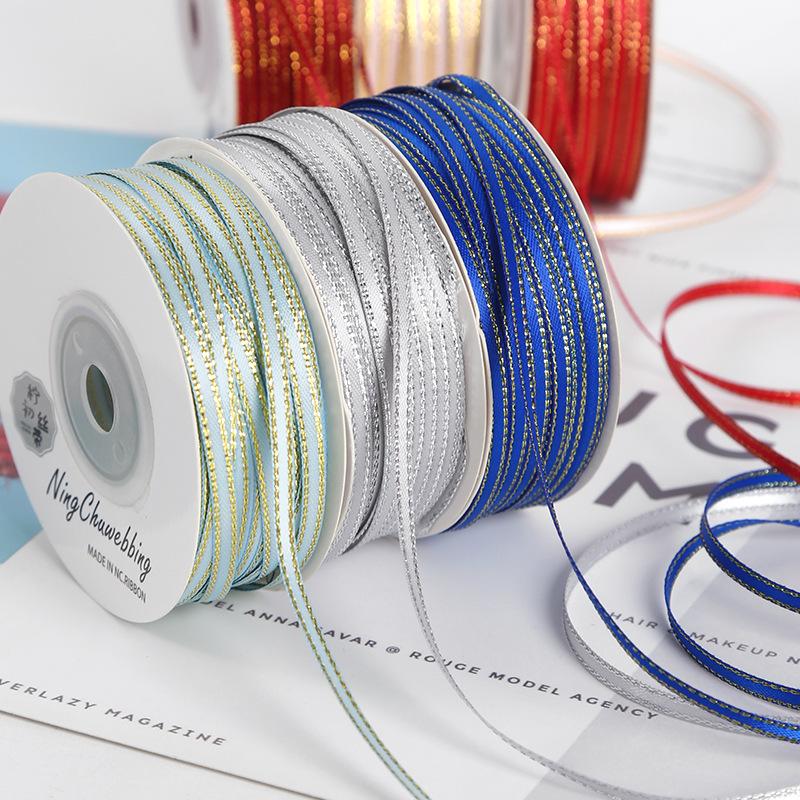 Trang Trí Noel Dải ruy băng vàng kim 3mm, lý tưởng cho gói quà, trang trí bánh, và DIY. Chất liệu satin cao cấp, dễ sử dụng cho mọi nhu cầu.