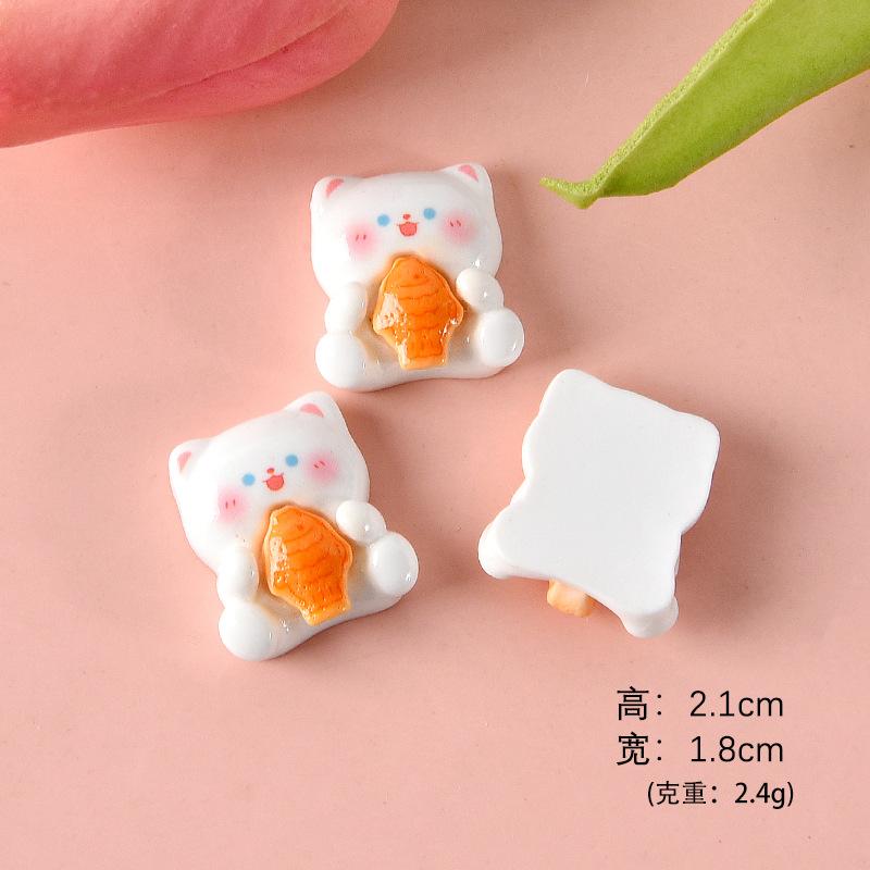 双手拿鲷鱼