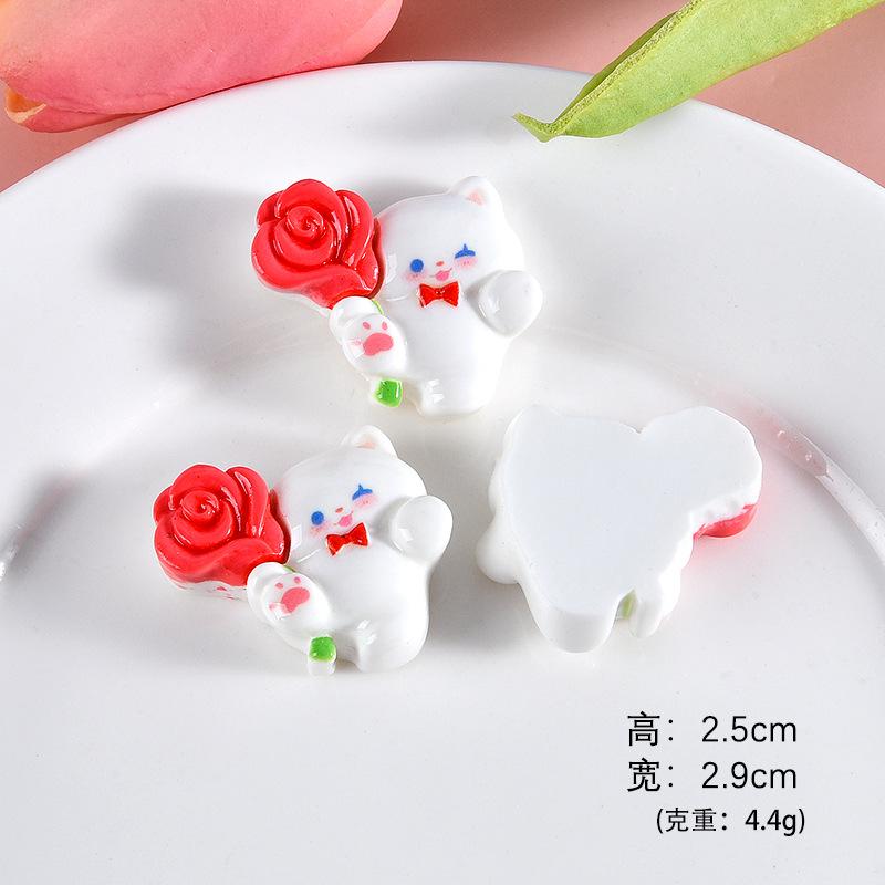 小猫抱玫瑰